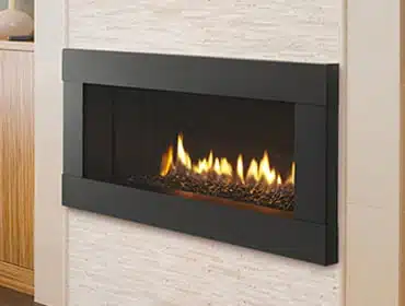 Modern gas fireplace with a sleek black frame